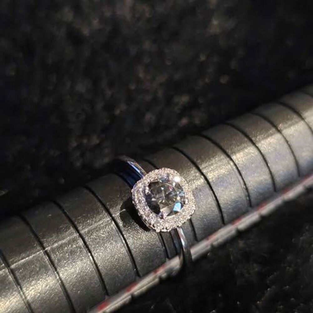 .5CTW Colored Moissanite Solitaire in halo setting of .925 Size 6